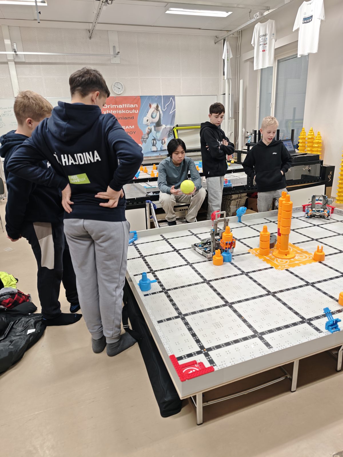 VEXperts Hajdina students watching a match at the Orimattila Regional VEX IQ Competition
